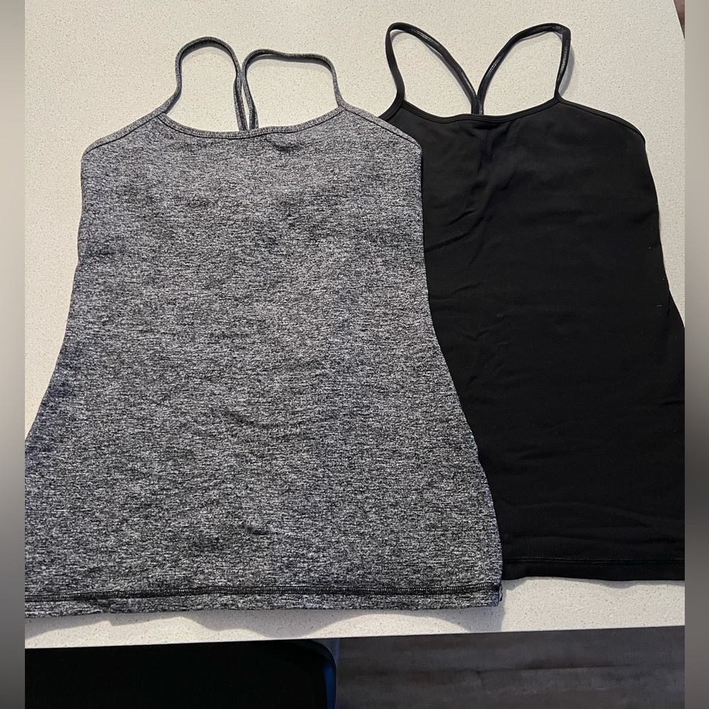 Two Lululemon yoga tank tops.